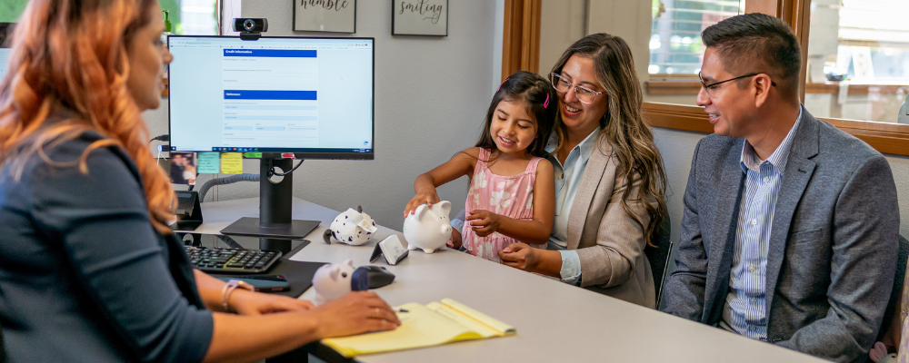 Opening Financial Accounts For Kids - Mother and child holding a piggy bank
